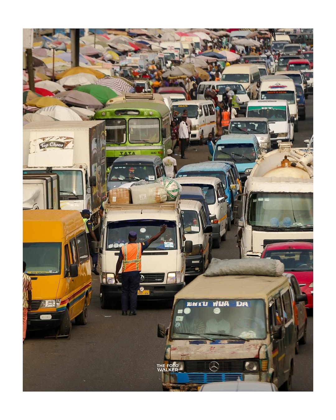 A trotro driving through an Accra neighbourhood